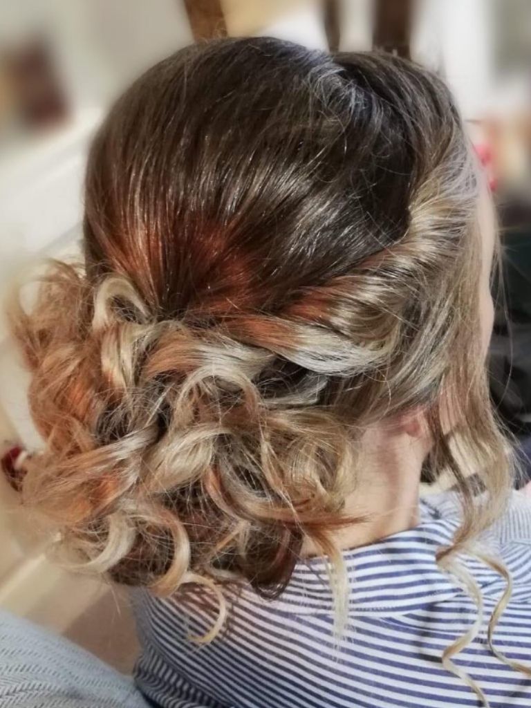 Woman with messy bun hairstyle