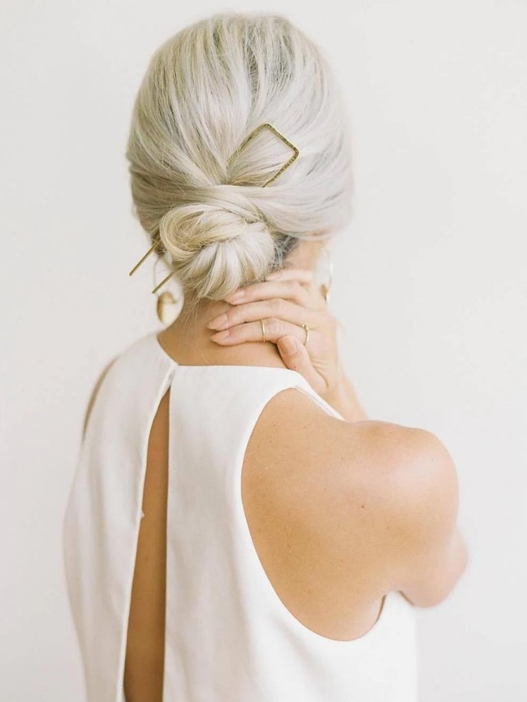 Sleek Updo with Pin bridal hairstyle
