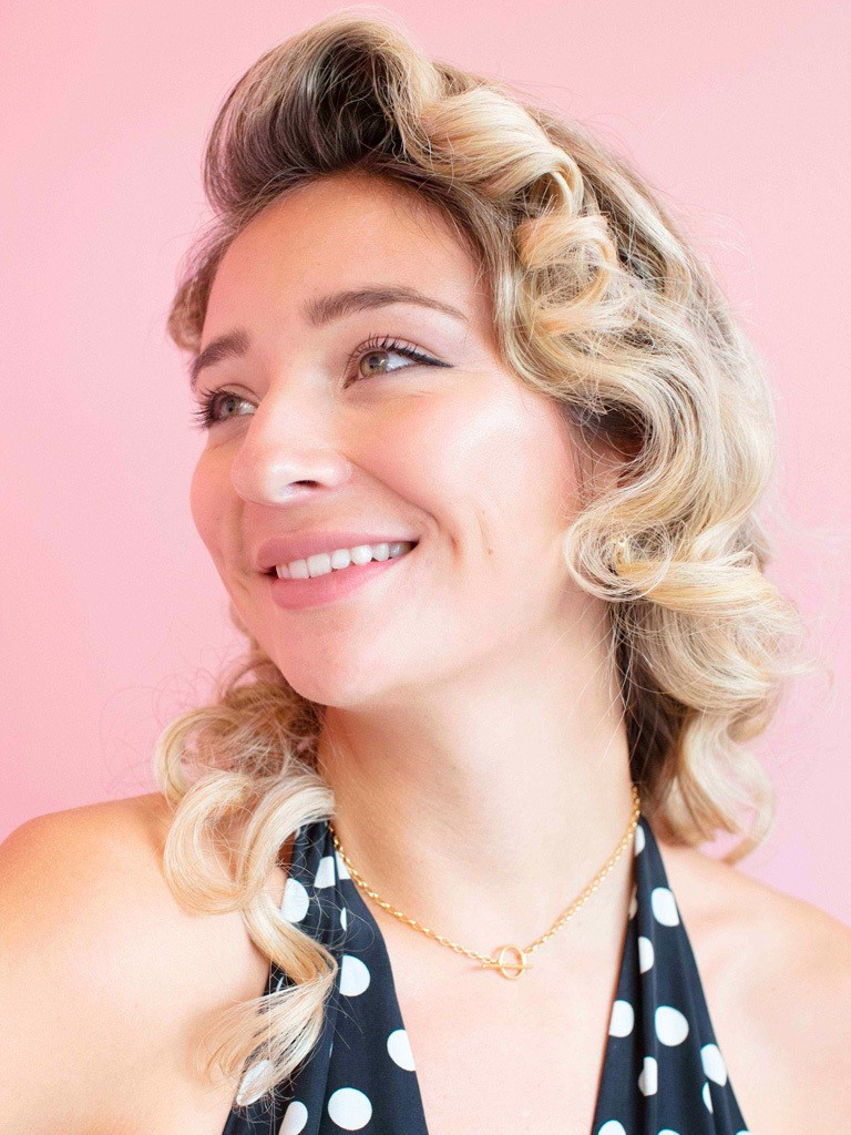 Woman with retro curly blonde hair