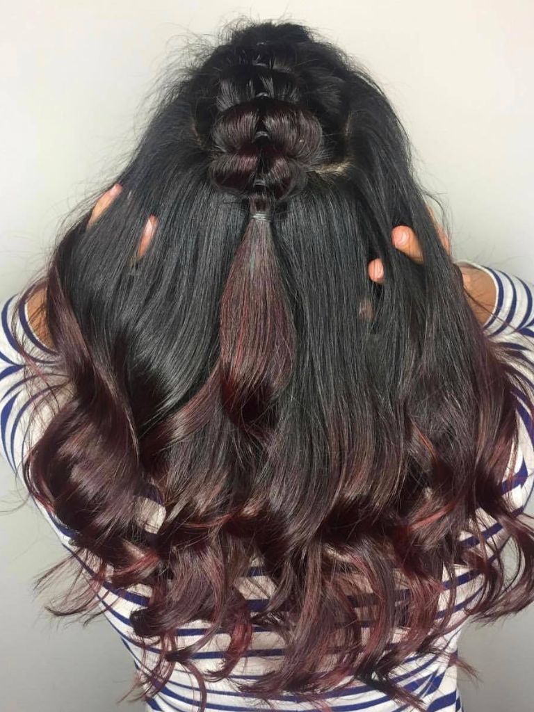 Woman with black to mahogany hair