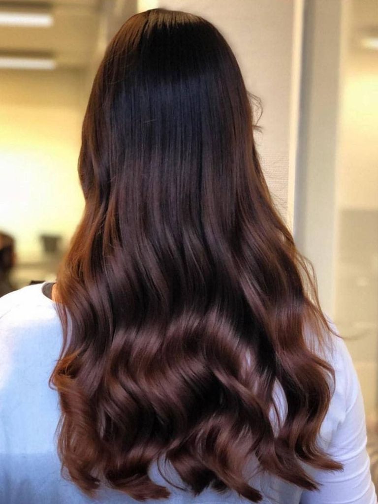 Woman with dark copper mahogany hair