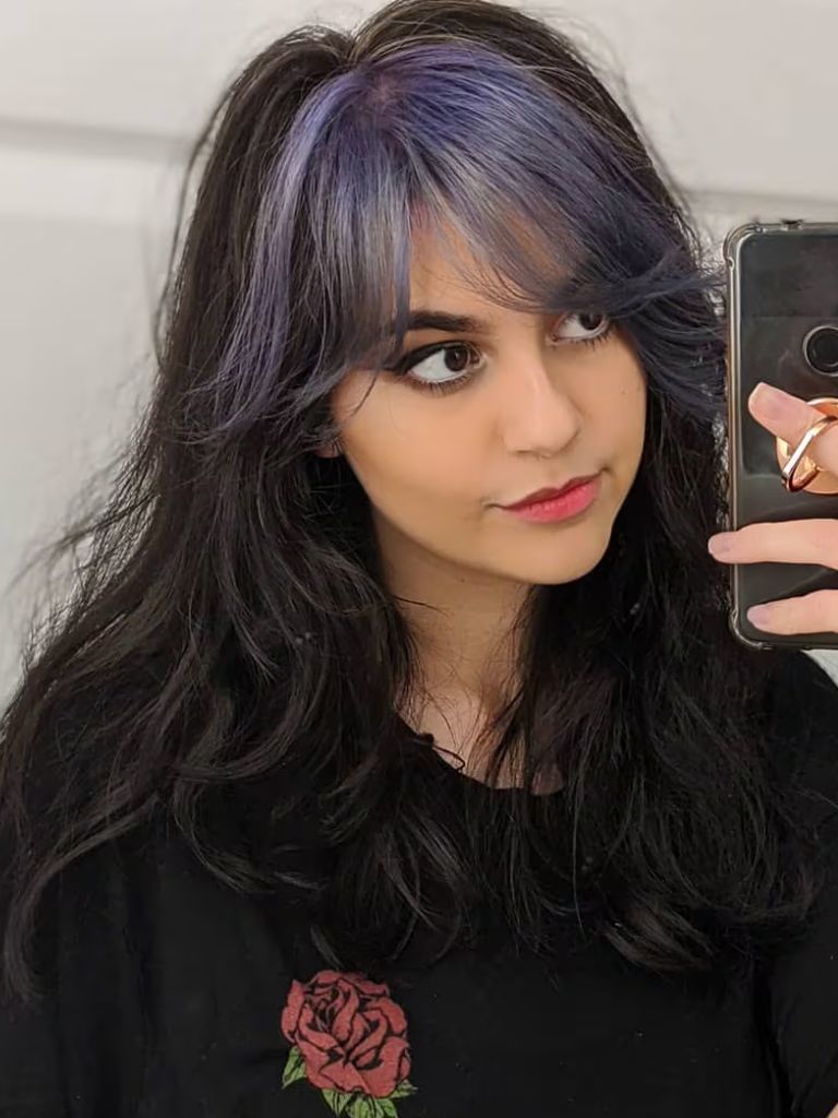 woman with dyed purple e-girl wispy bangs