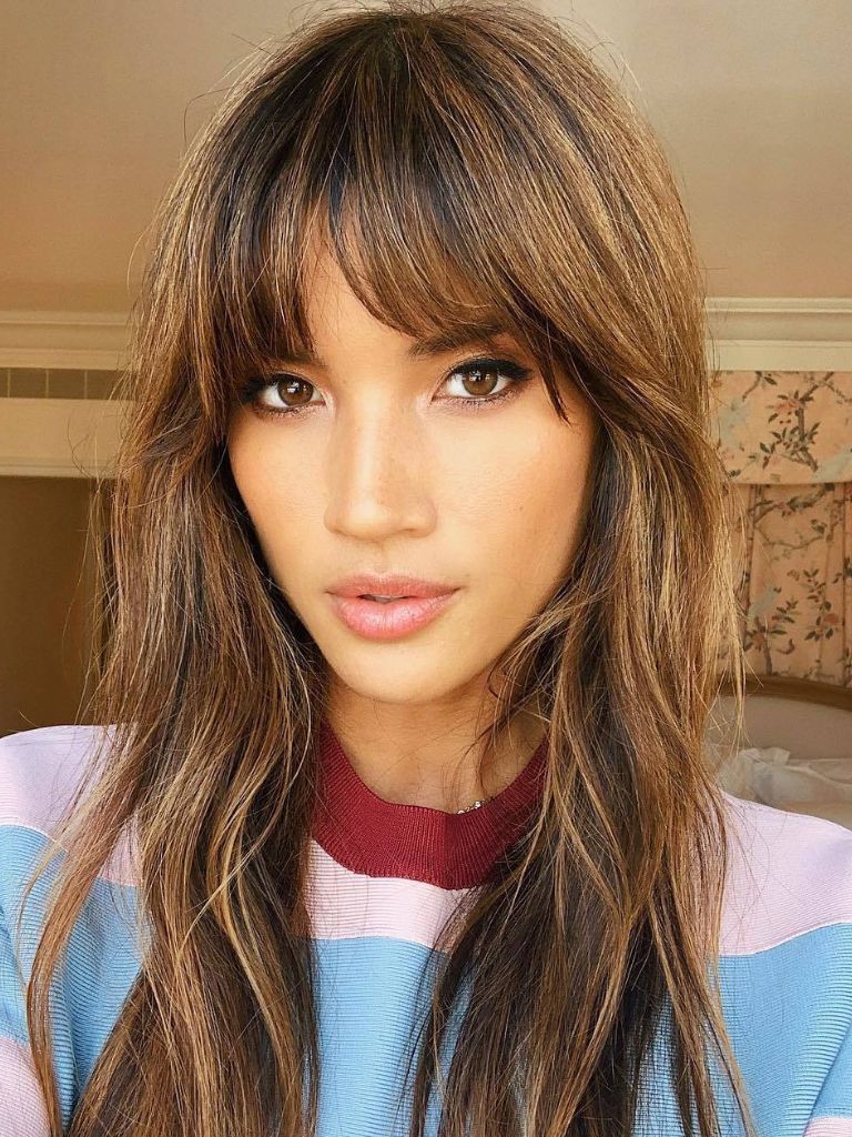 Woman with long brown balayage