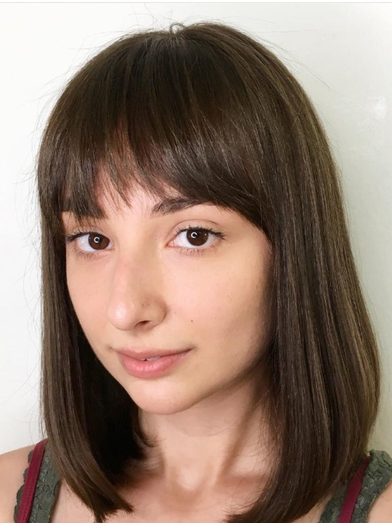 Woman with classic fringe and brown hair