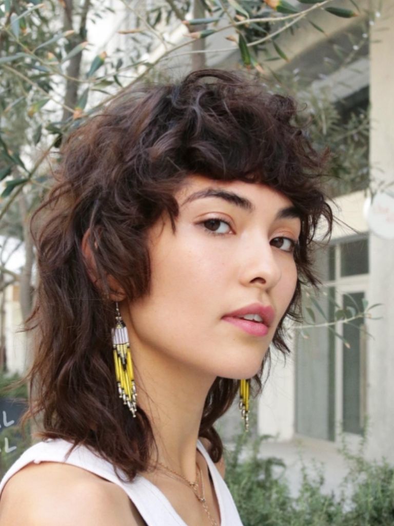 Woman with mullet bangs