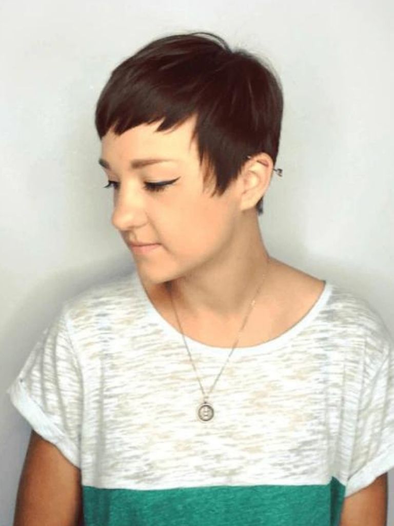 Woman with brown pixie cut