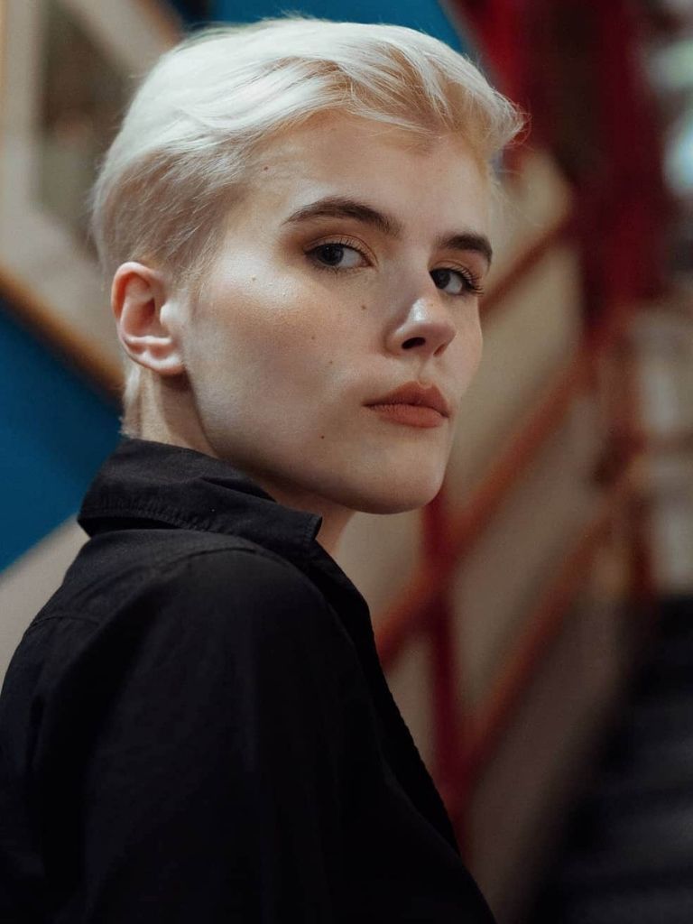 woman with blonde pixie haircut