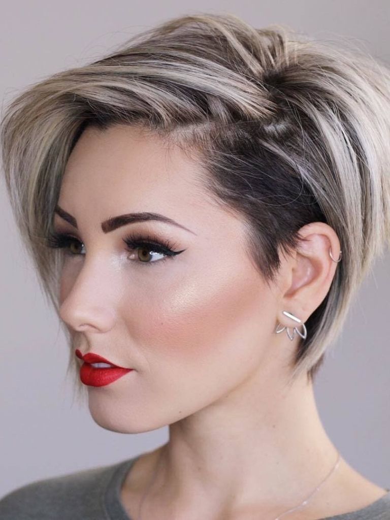 woman with an ash blonde pixie cut bob