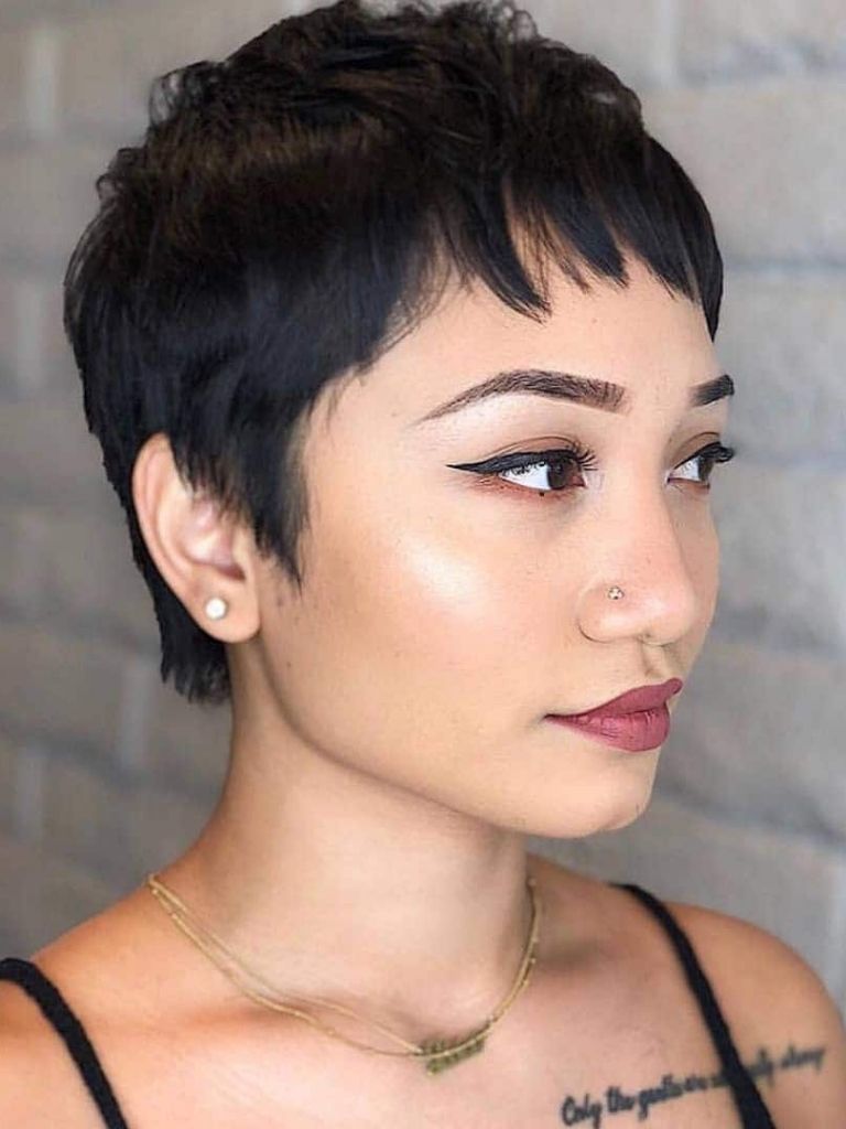 woman with dark textured pixie haircut