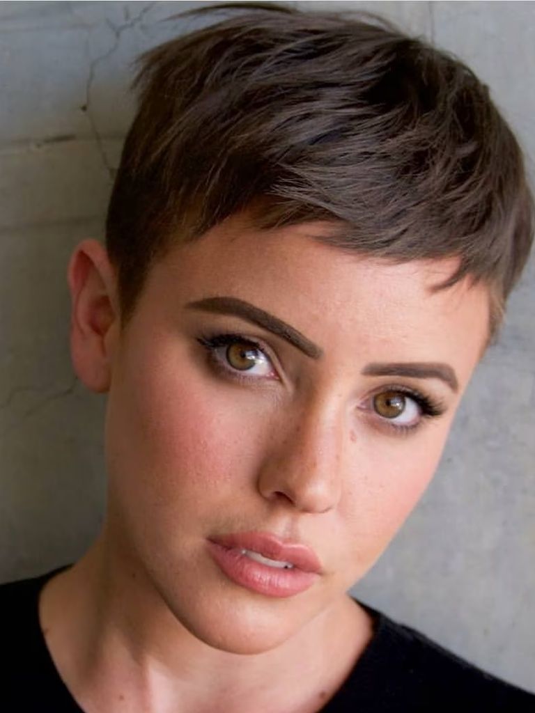 woman with short brown pixie cut
