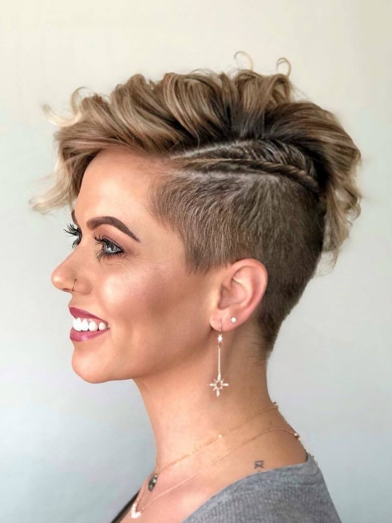 woman with golden blonde pixie cut with undercut
