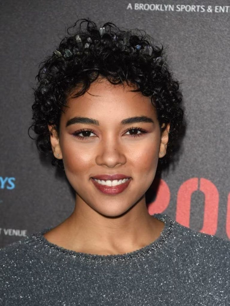 Woman with curly pixie cut