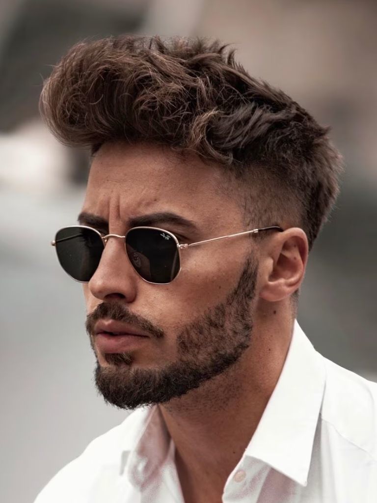 Man with messy long top and undercut