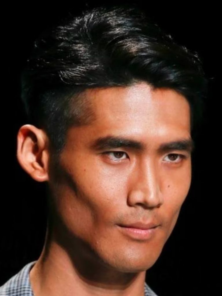Subtle side parting and undercut