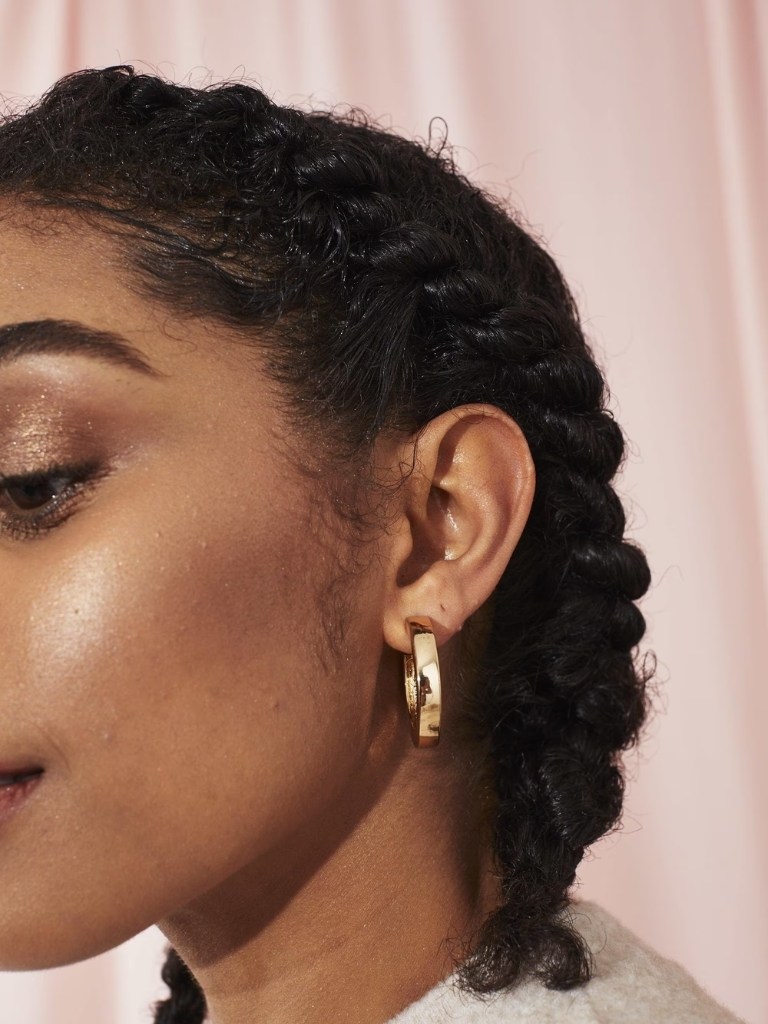 Woman with 3C hair in a braid