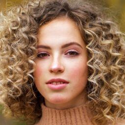 woman with curly blonde hair