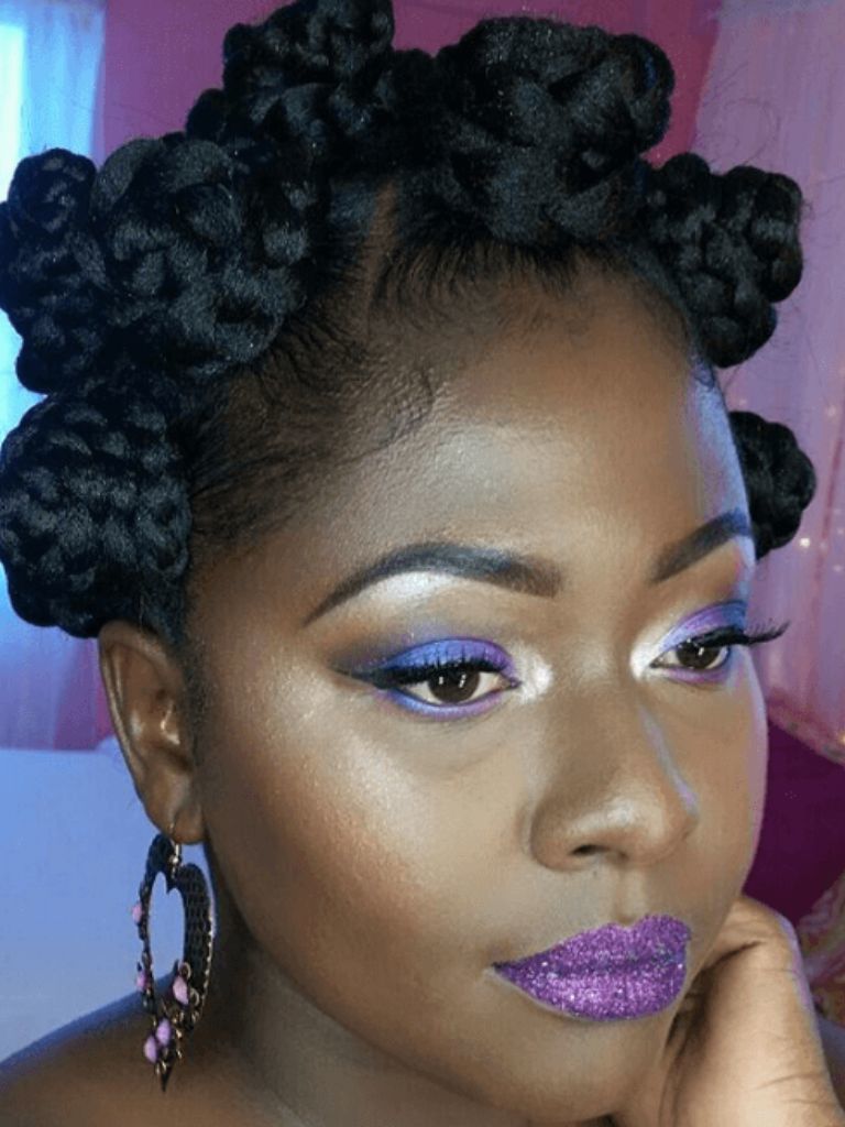 Woman with braided Bantu knots.