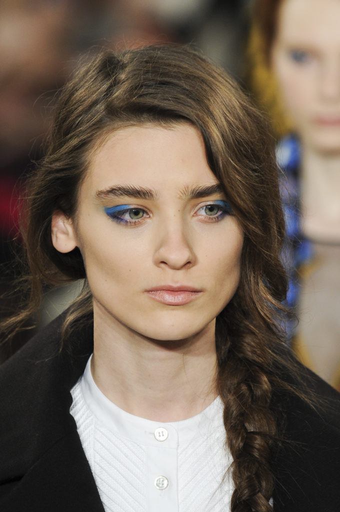 model with side braid hairstyle for thick hair