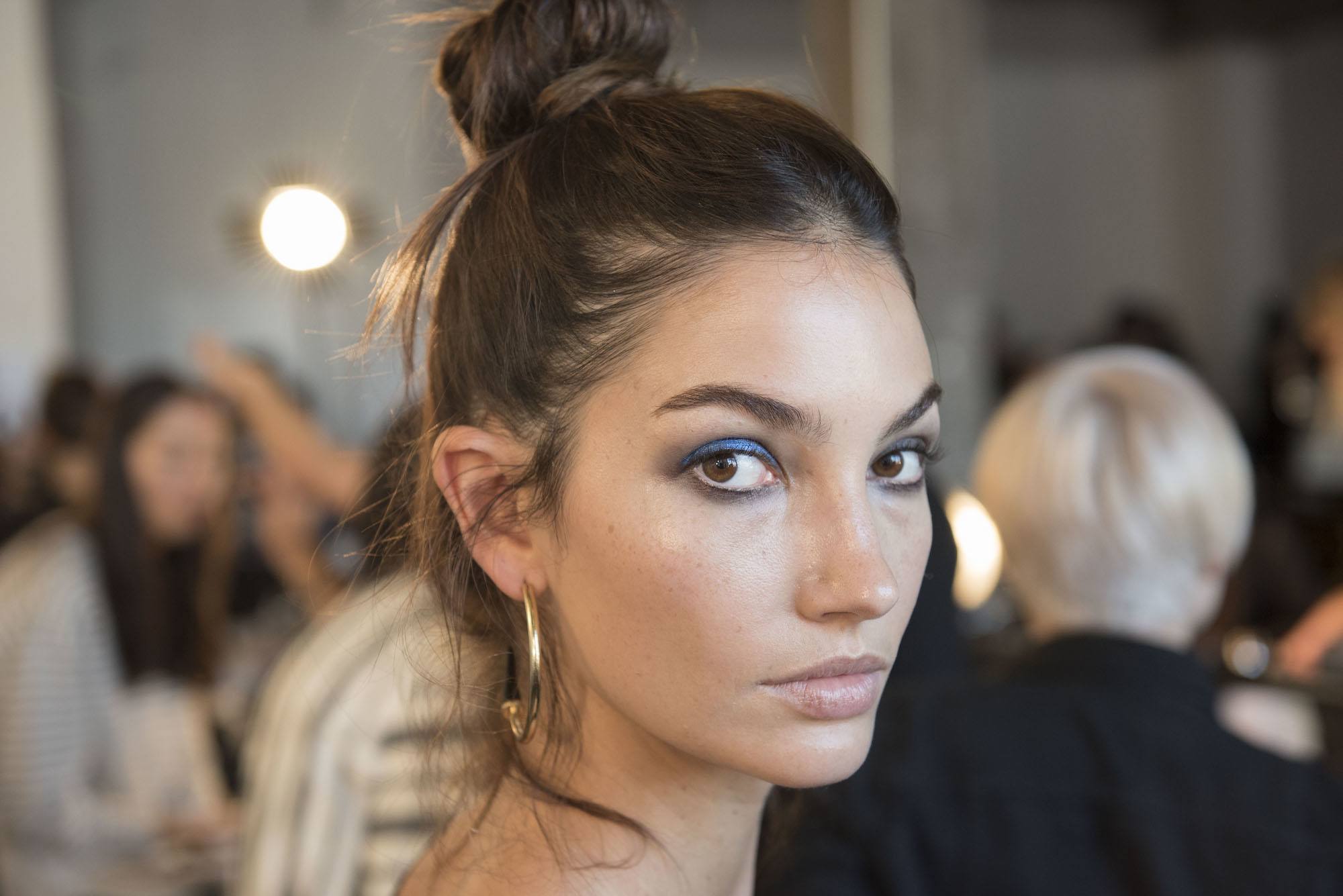 everyday hairstyles for work messy top knot