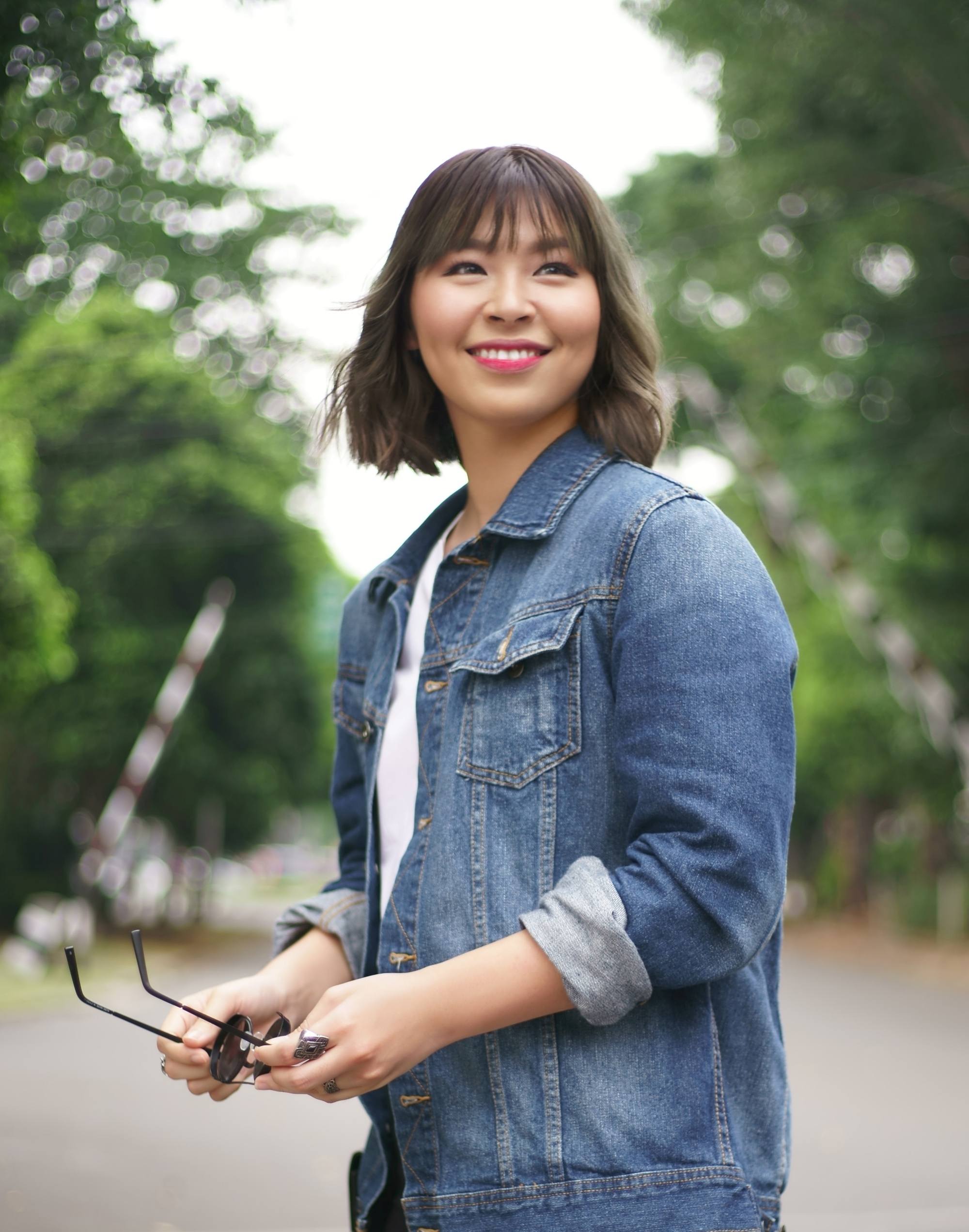 Asian woman with short hair and bangs for round face