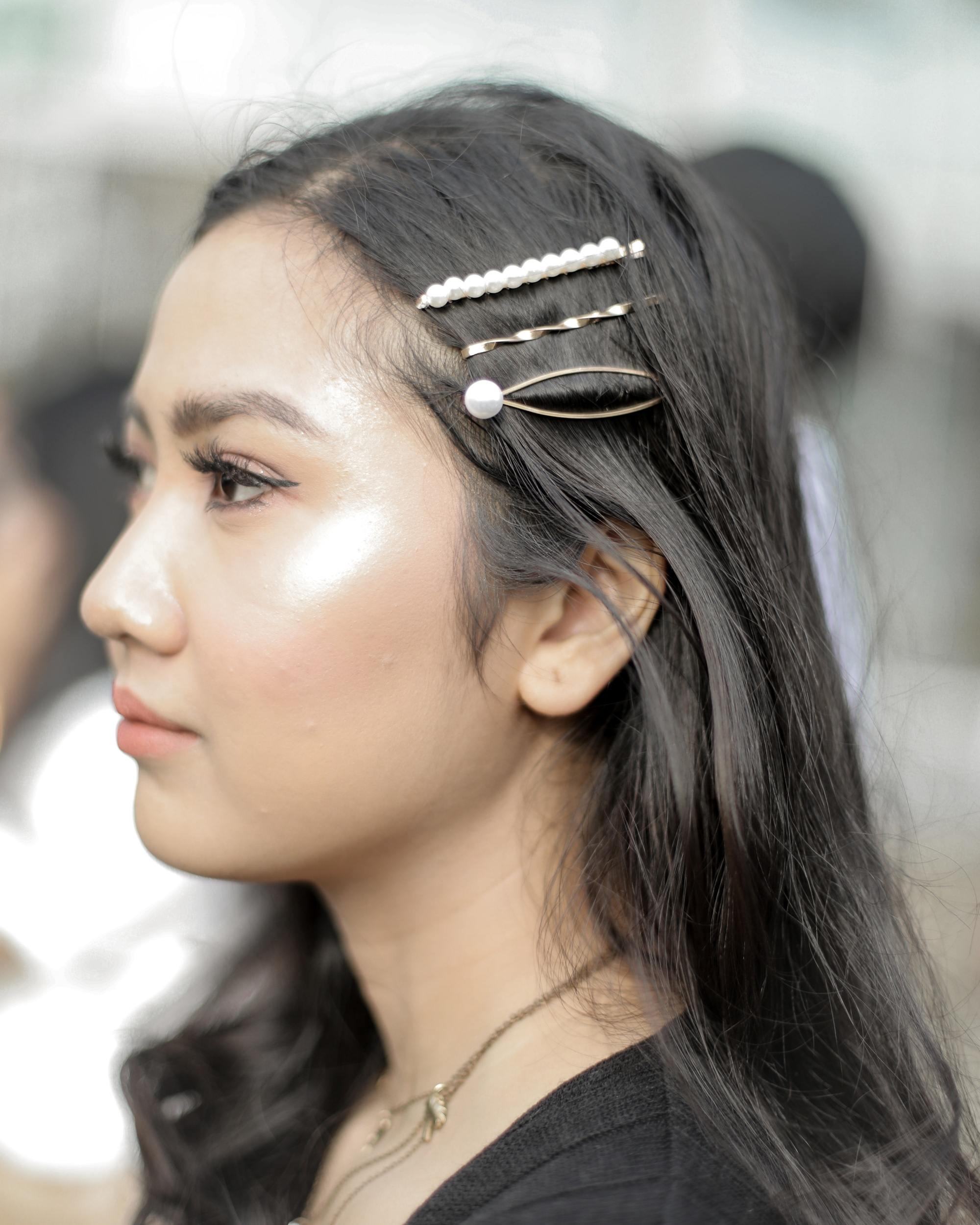Asian woman with hair clips on her long hair
