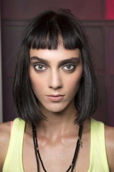 how to pull off short bangs