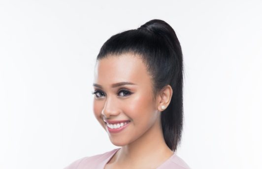 Girl with easy commuter friendly high ponytail hairstyle