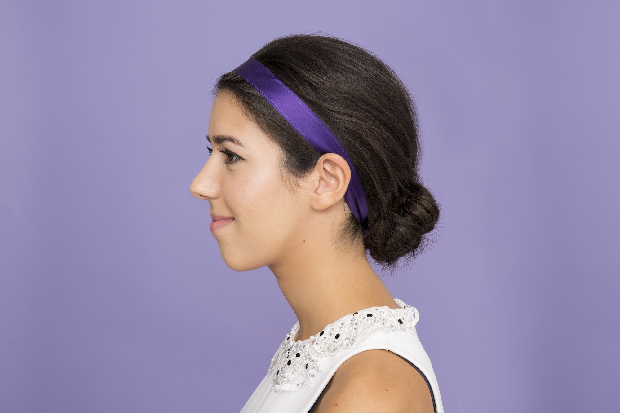 low bun hairstyle with ribbon