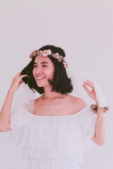 Asian woman with a flower crown as her wedding hairstyle for short hair