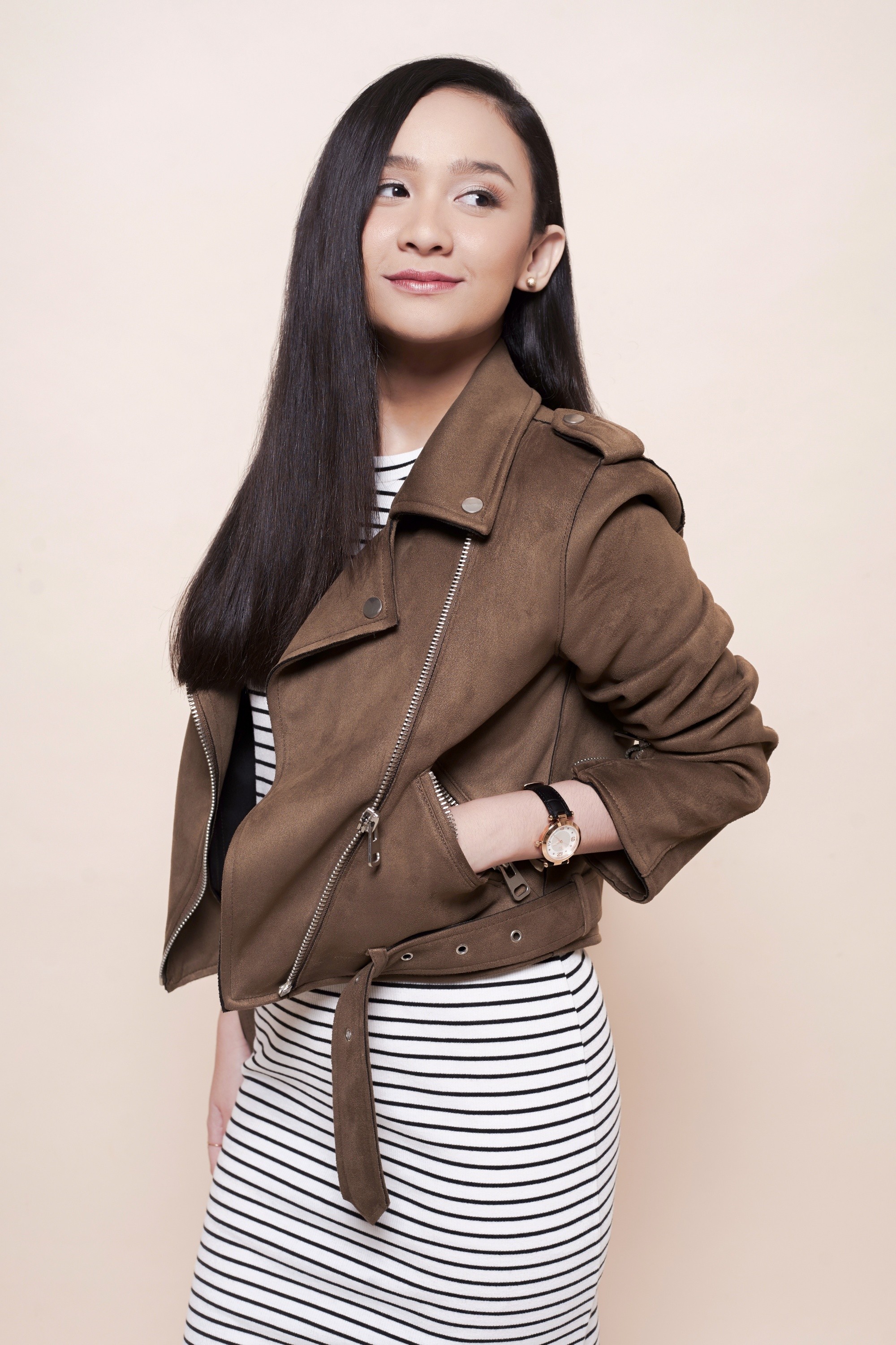 Keratin Smoothing Treatment: Asian woman with long straight black hair wearing a jacket