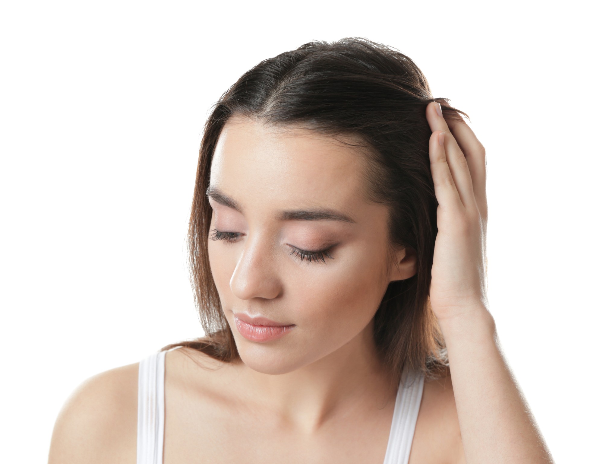 hair fall: Girl is flipping a small section of hair away from her face