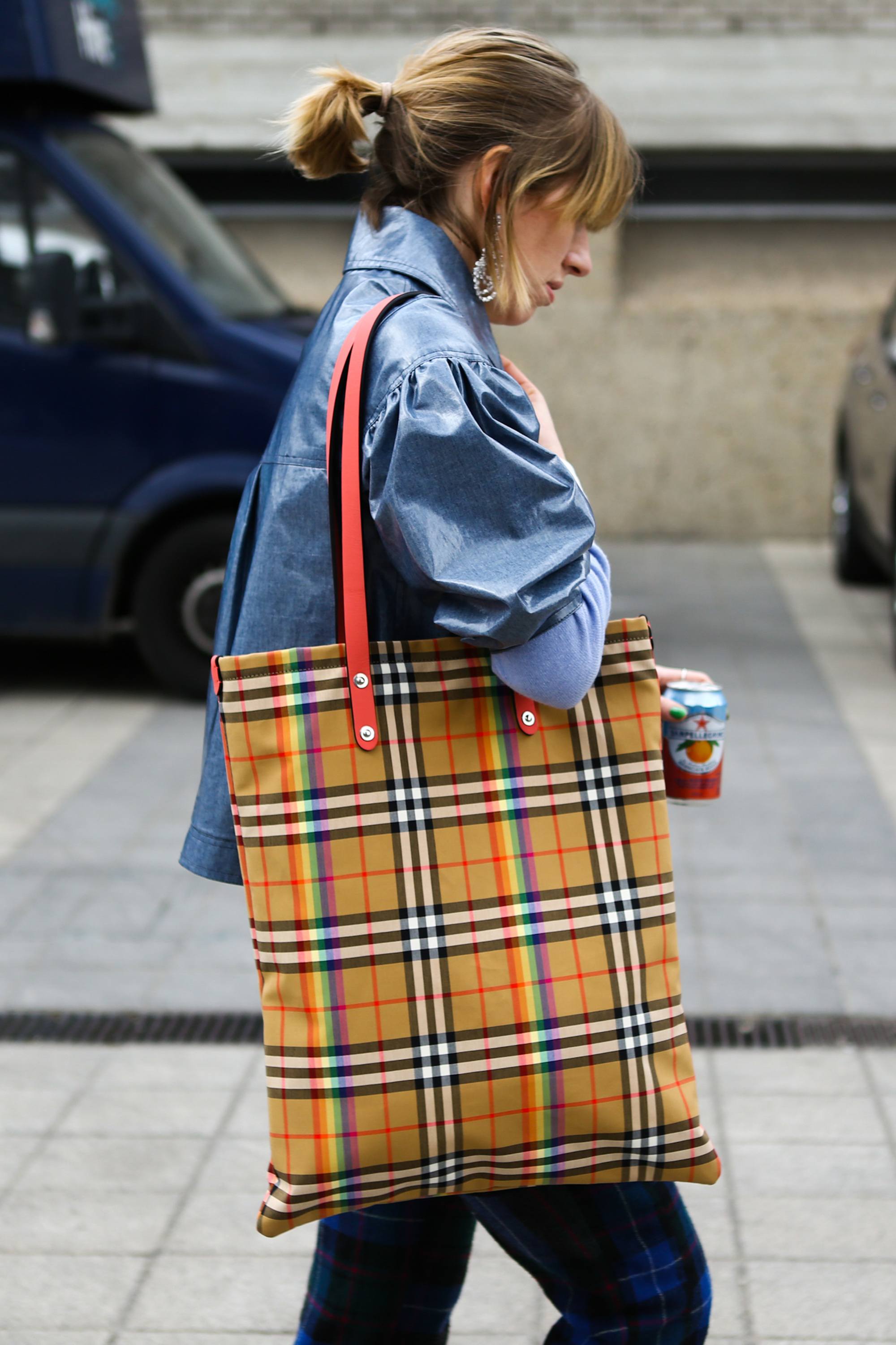Woman with short hair in a ponytail