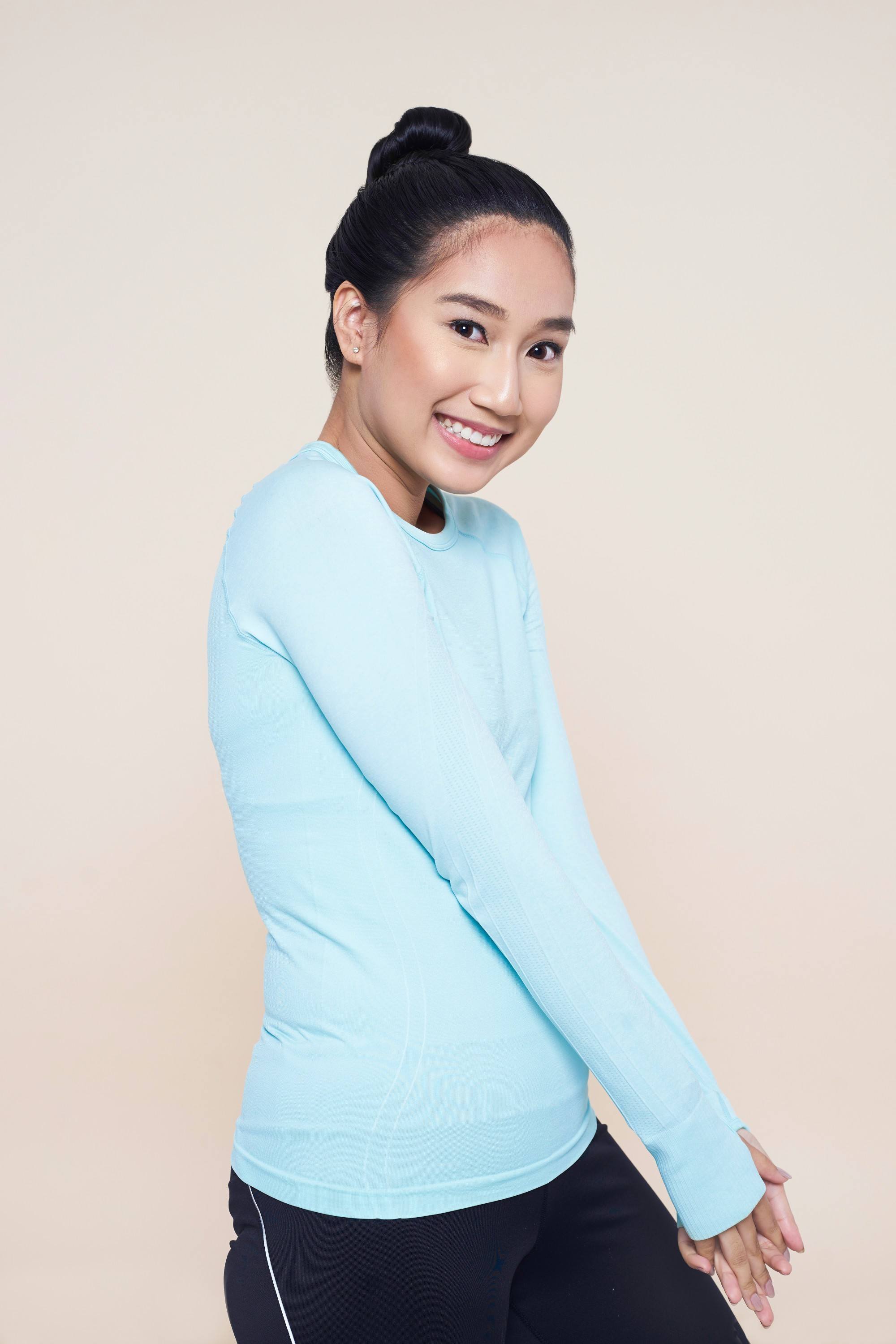 easy hairstyles for long hair: shy girl in a ballerina bun