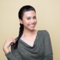 Easy braids for long hair: Asian woman with long hair in French braid