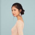 Side hairstyles: Asian woman with side braid bun