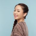 Side hairstyles: Asian woman with side French braid