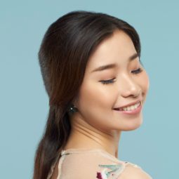 Asian woman with half up half down with braid