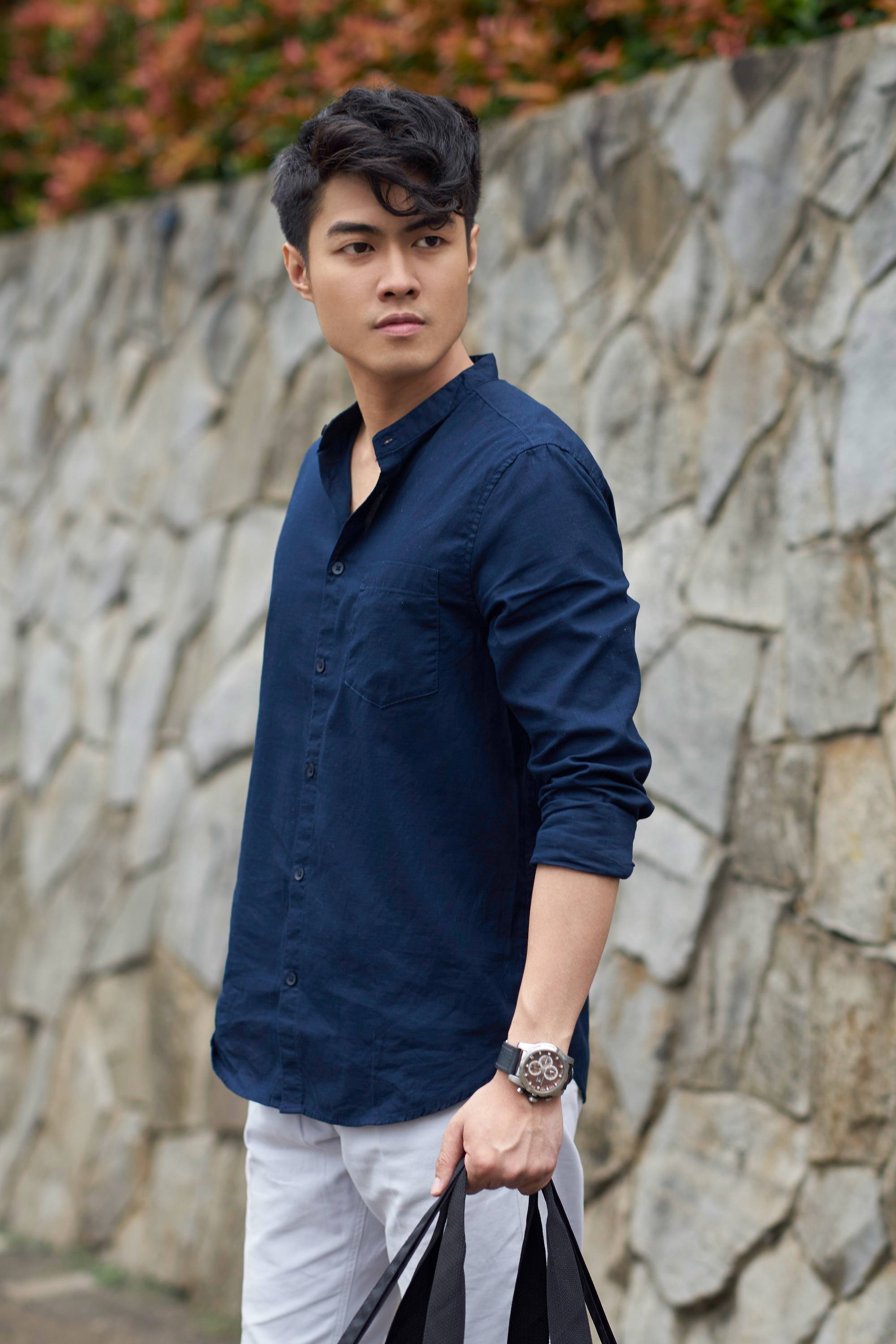 Asian man with textured and tousled medium hairstyle