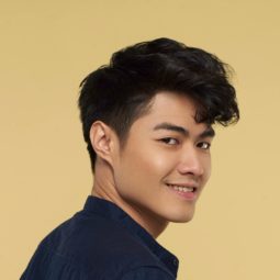 Asian man with textured and tousled medium hairstyle