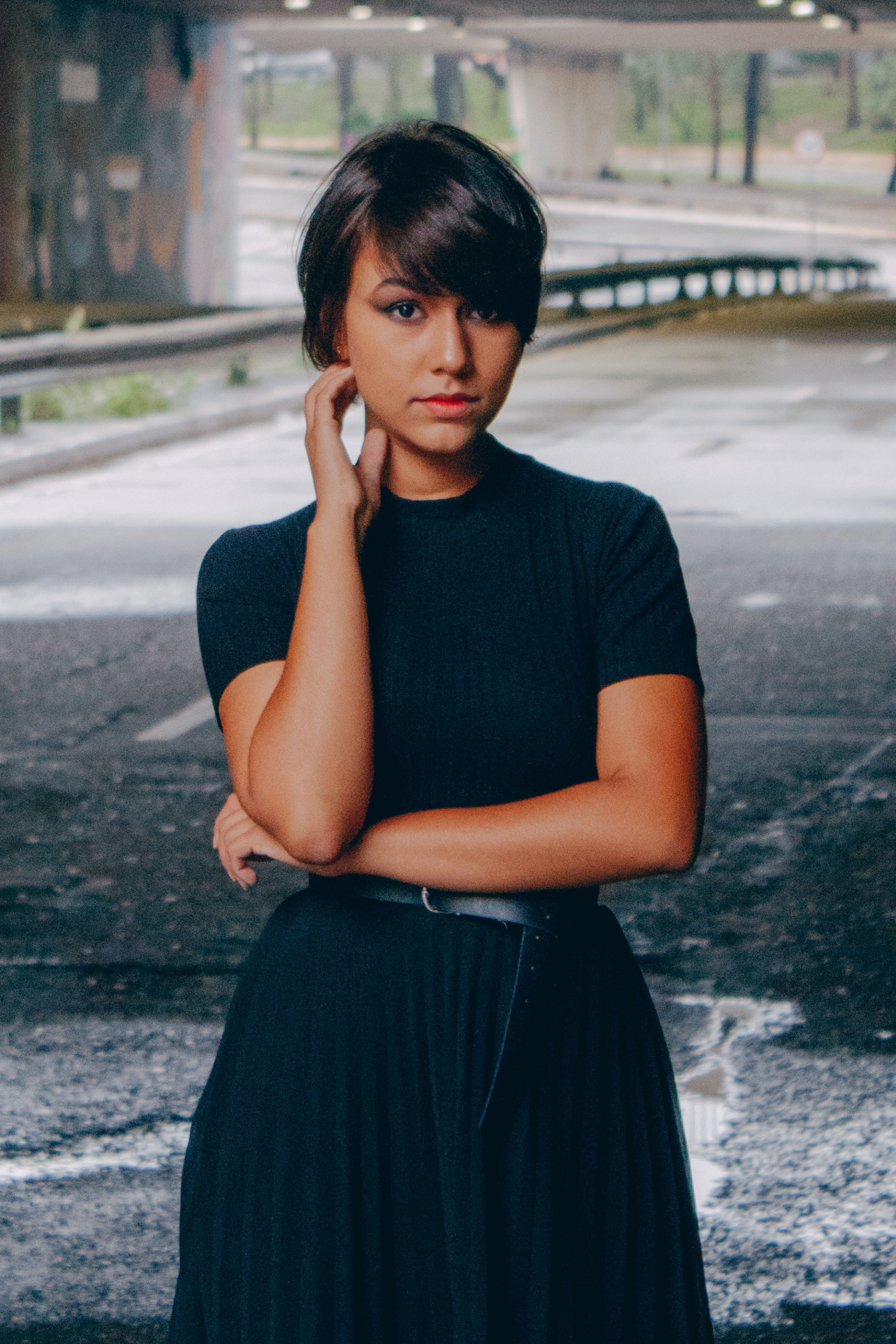 Asian woman with a long pixie cut