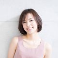Asian woman with Asian short hair with side swept bangs