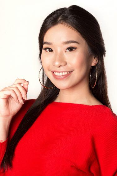 #BeautyThatCares: Asian woman with long dark hair wearing a red top