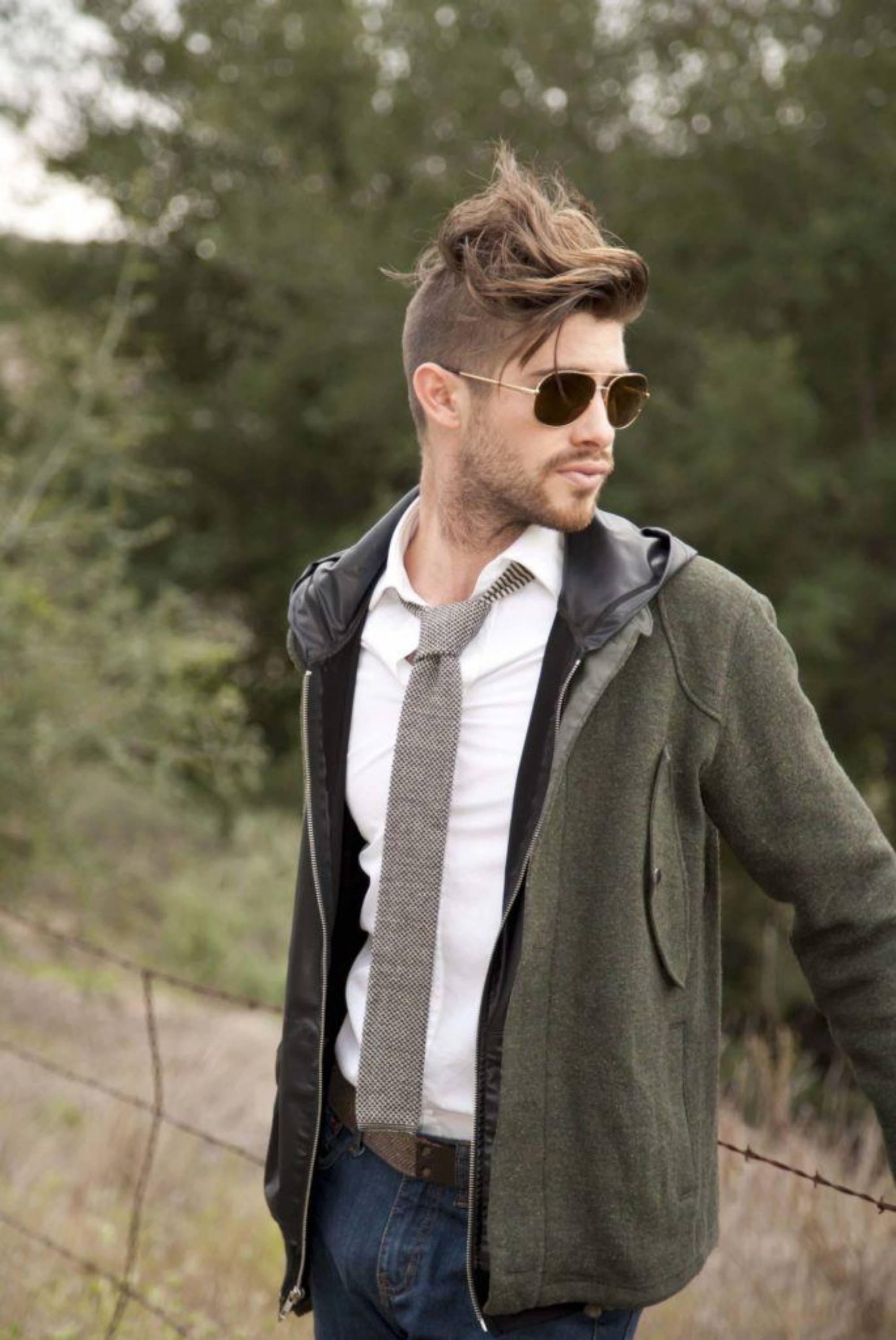 Haircuts for men with thick hair: a Caucasian man sporting a disconnected undercut
