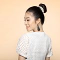 Asian woman with a bun hairstyle