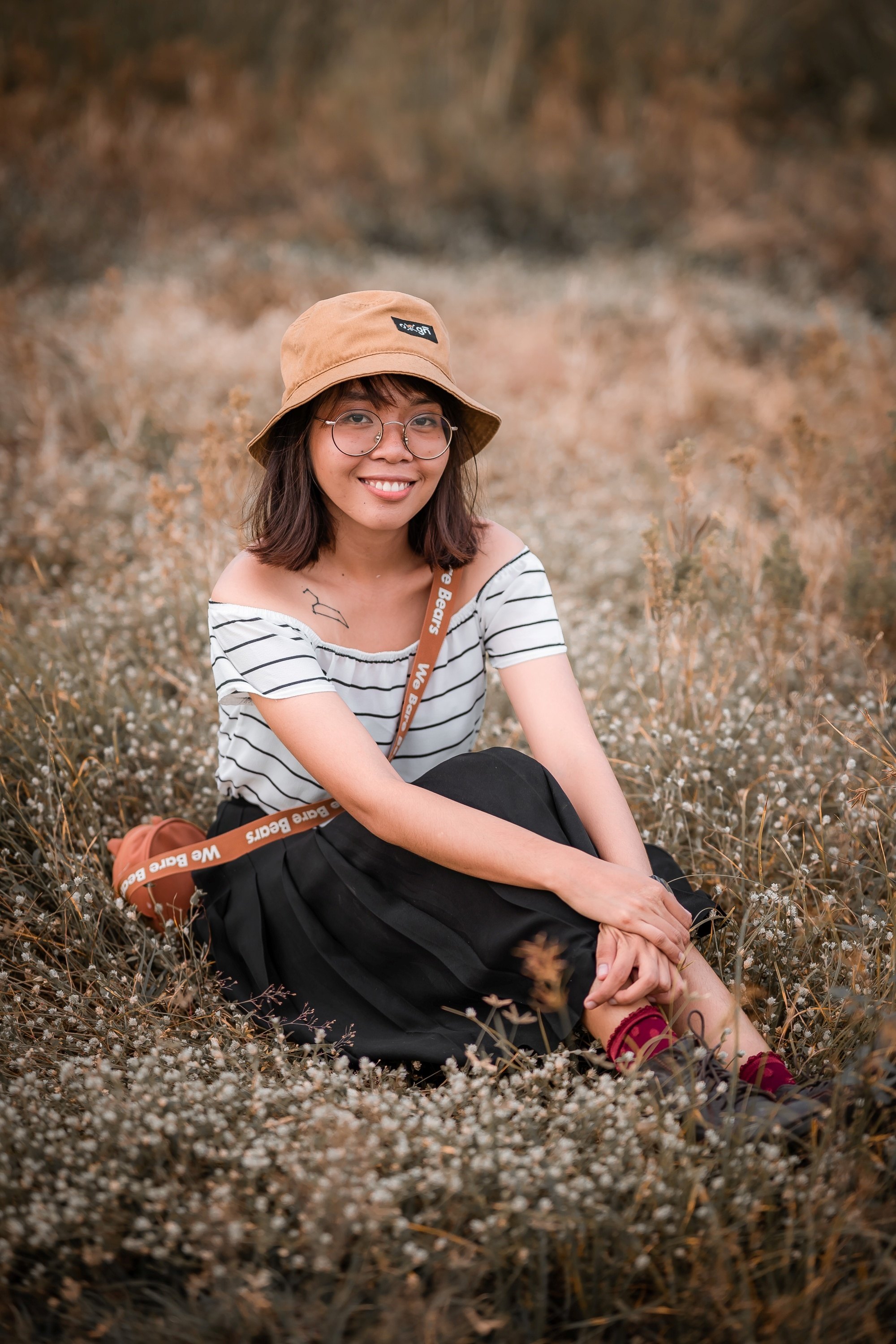 Asian woman wearing a hat