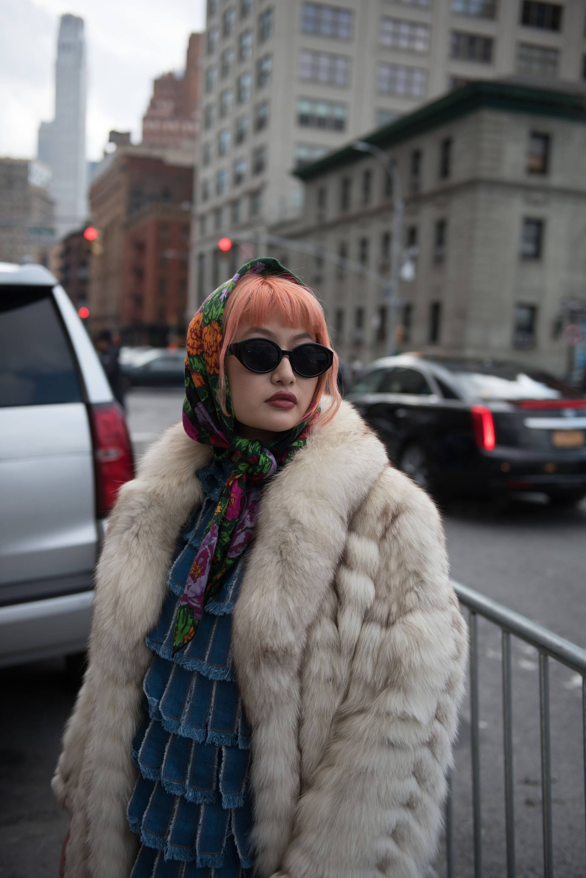 New York Fashion Week Street Style: girl is wearing a bandana over her orange-colored hair