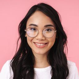 Hairstyles for glasses: Asian woman with long hair wearing eyeglasses