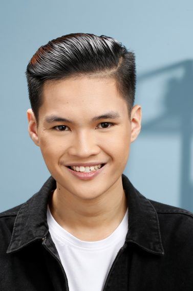 Asian man with slicked back for men smiling hair