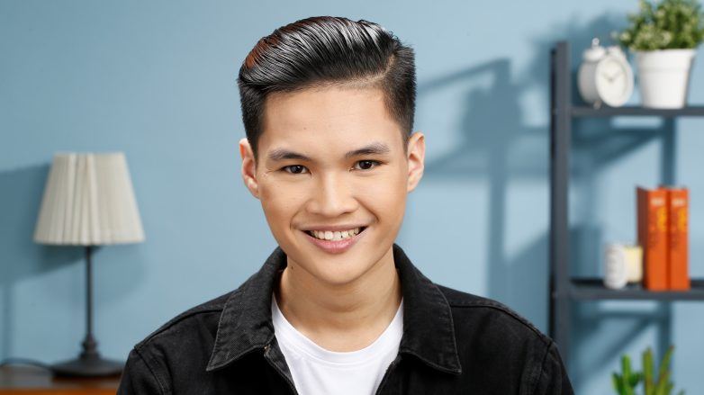 Asian man with slicked back for men smiling hair