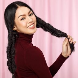 Asian woman with twin fishtail braids for long hair